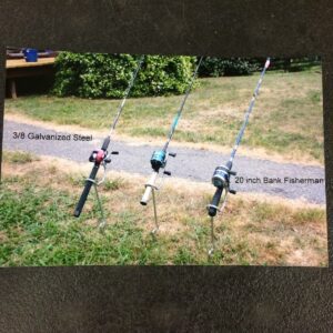 Three fishing rods are attached to a pole.