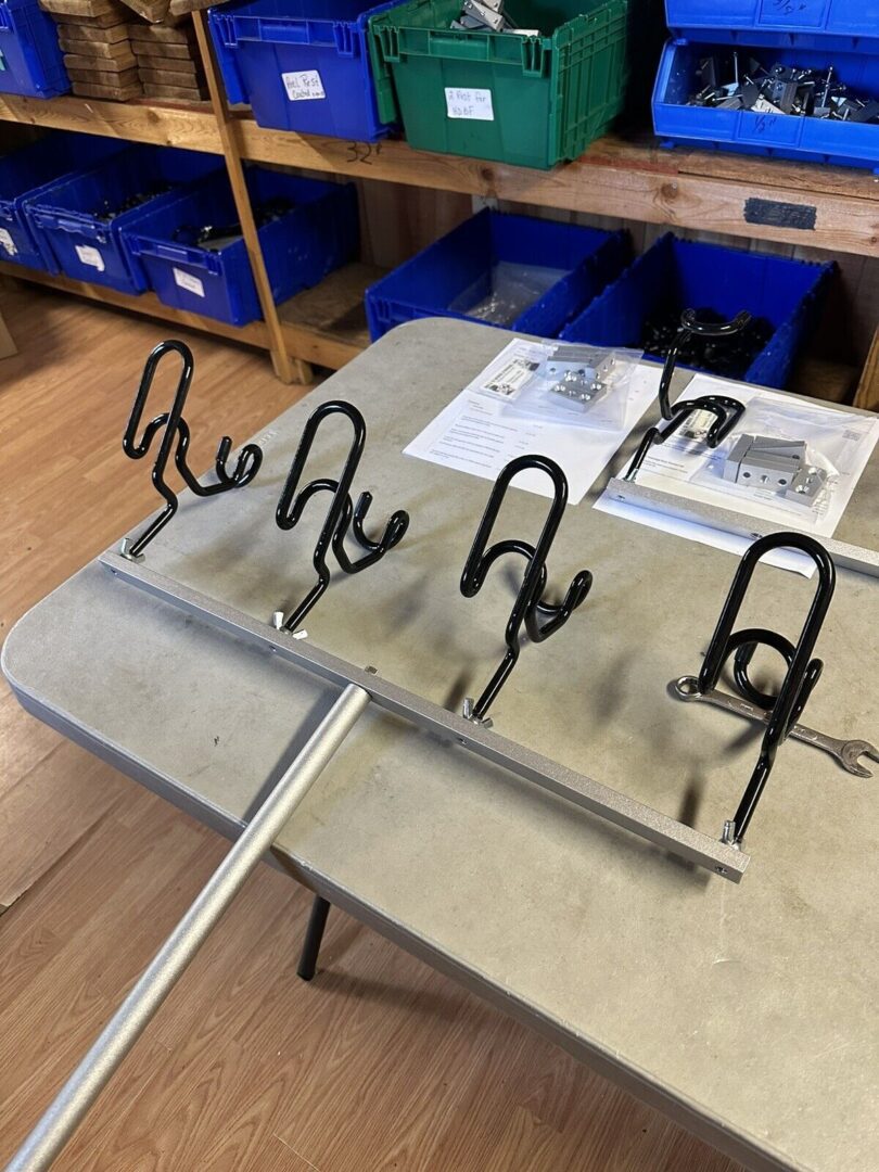 A table with several metal chairs on it.