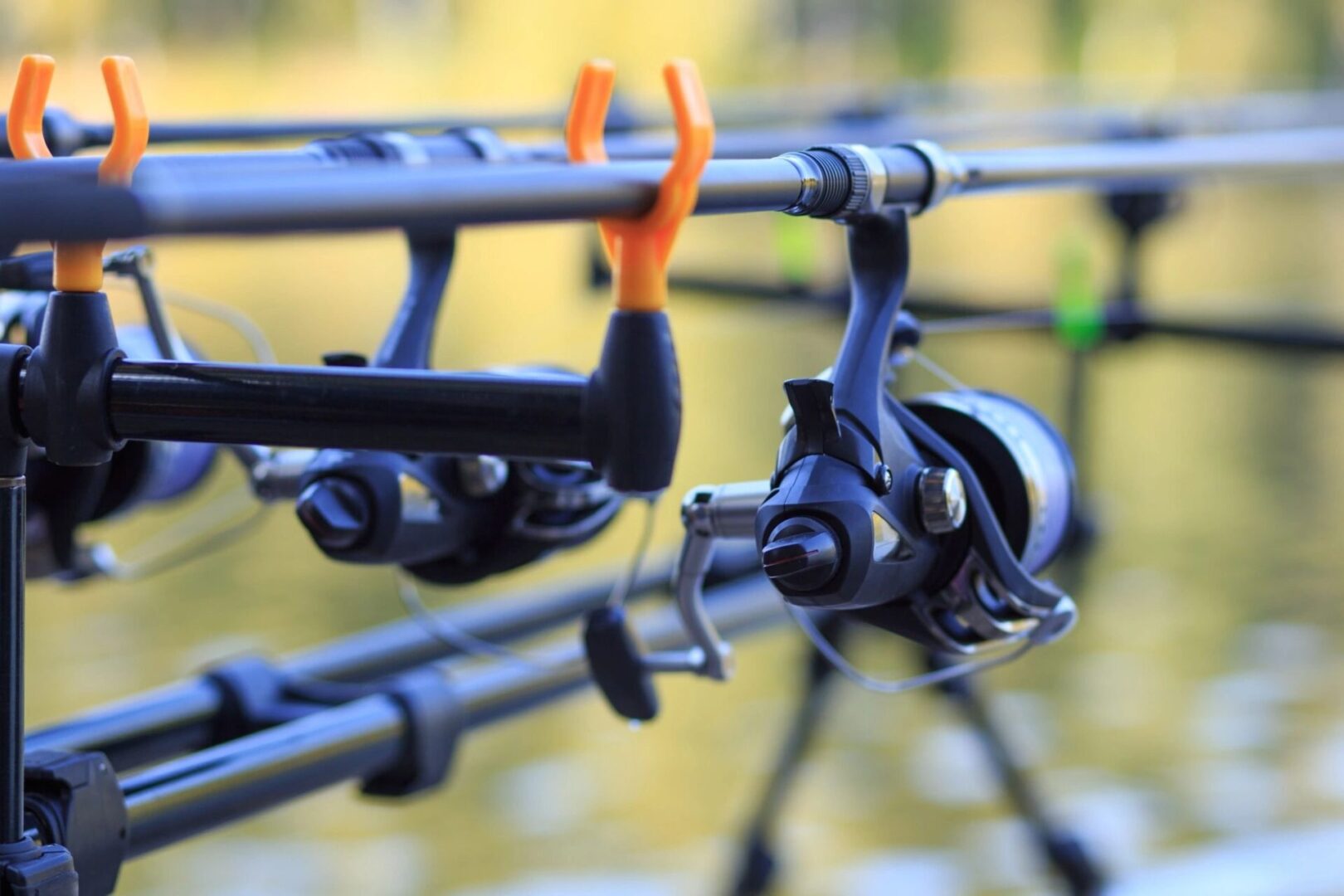 A close up of fishing rods with reels attached