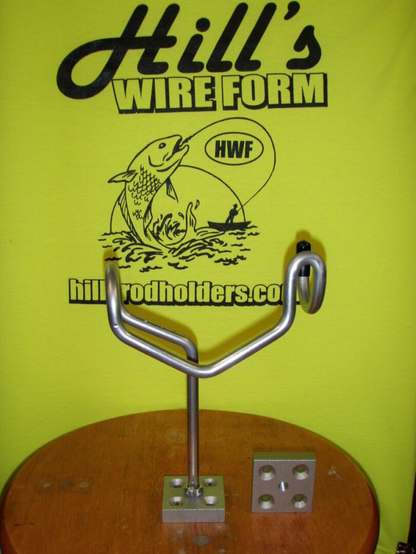 A metal wire holder on top of a wooden table.